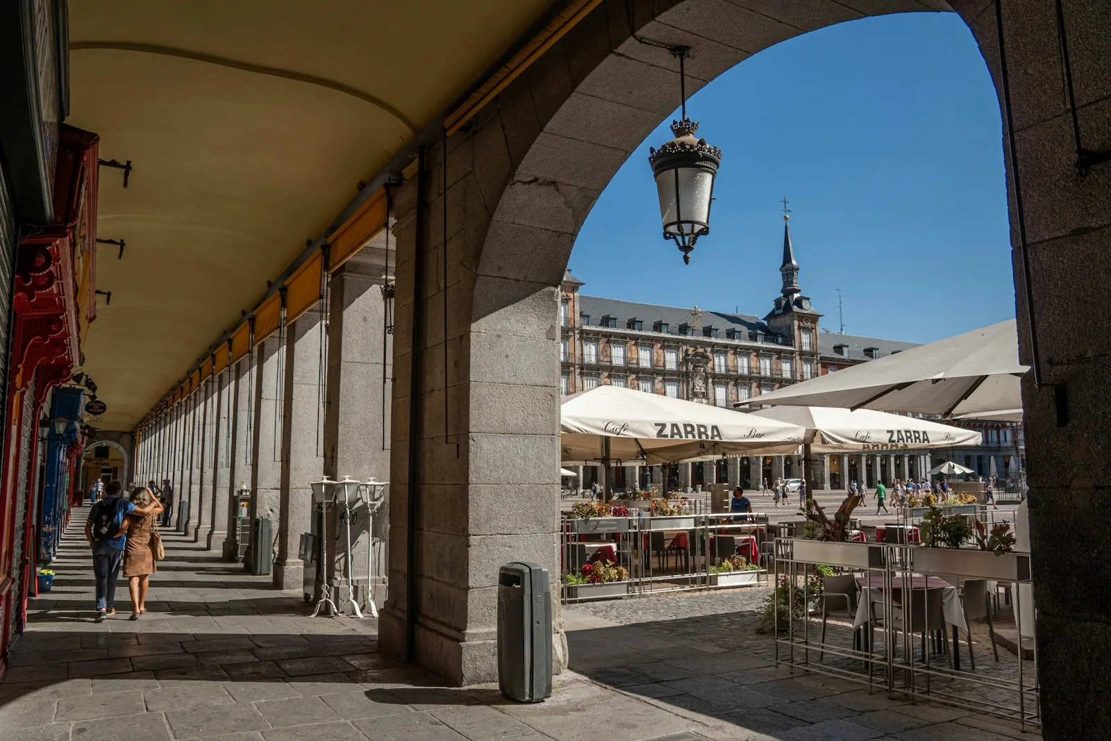 Market stalls and shoppers along Ribera de Curtidores in Madrid